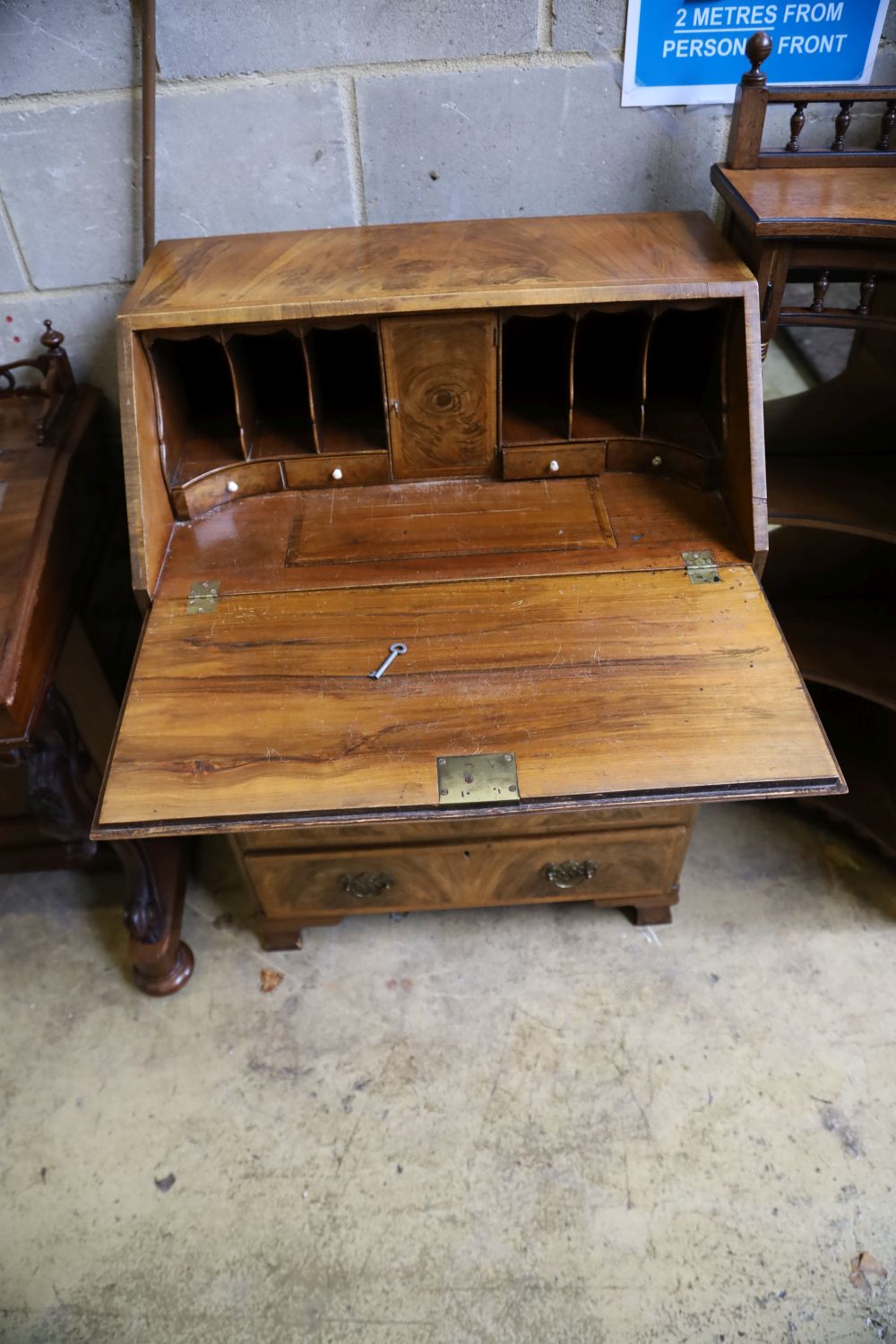 An early 20th century George I style walnut bureau, width 66cm, depth 40cm, height 100cm